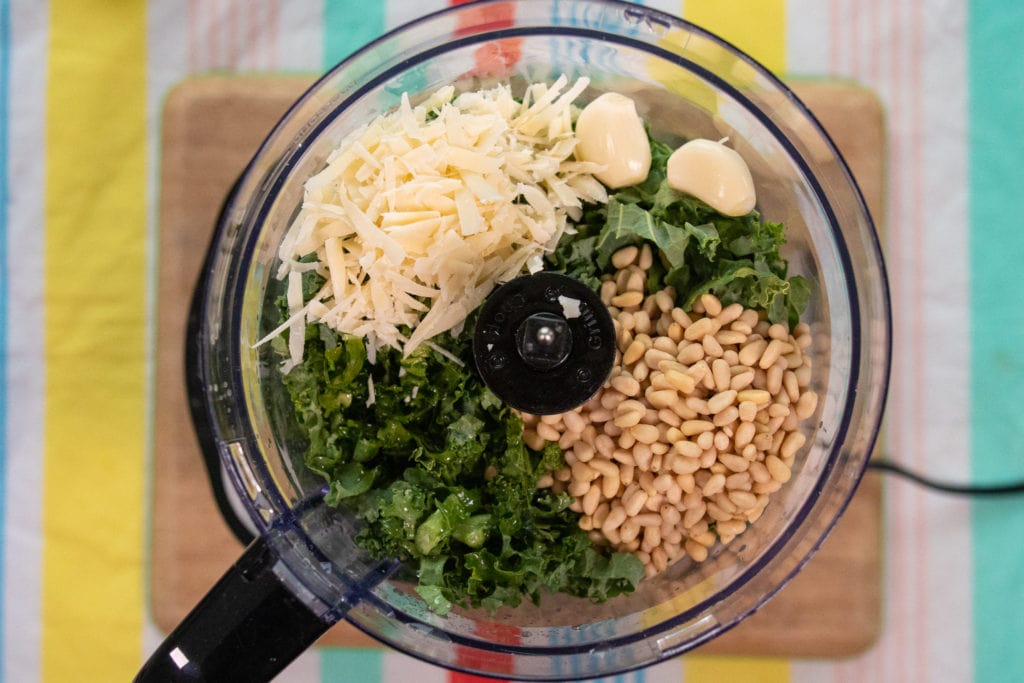 Kale pesto ingredients inside the blender