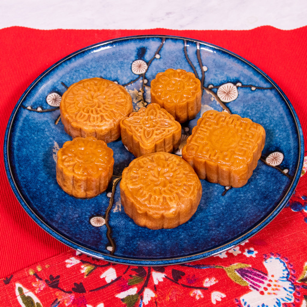 Mooncakes served on a blue plate