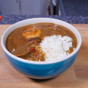 Gumbo served with white rice on top