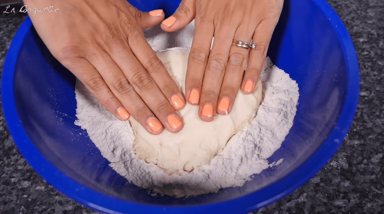 Before stretching the dough, flour thoroughly in a bowl