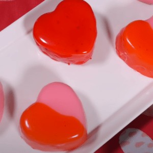 Frozen Mousse hearts with mirror glaze on a platter