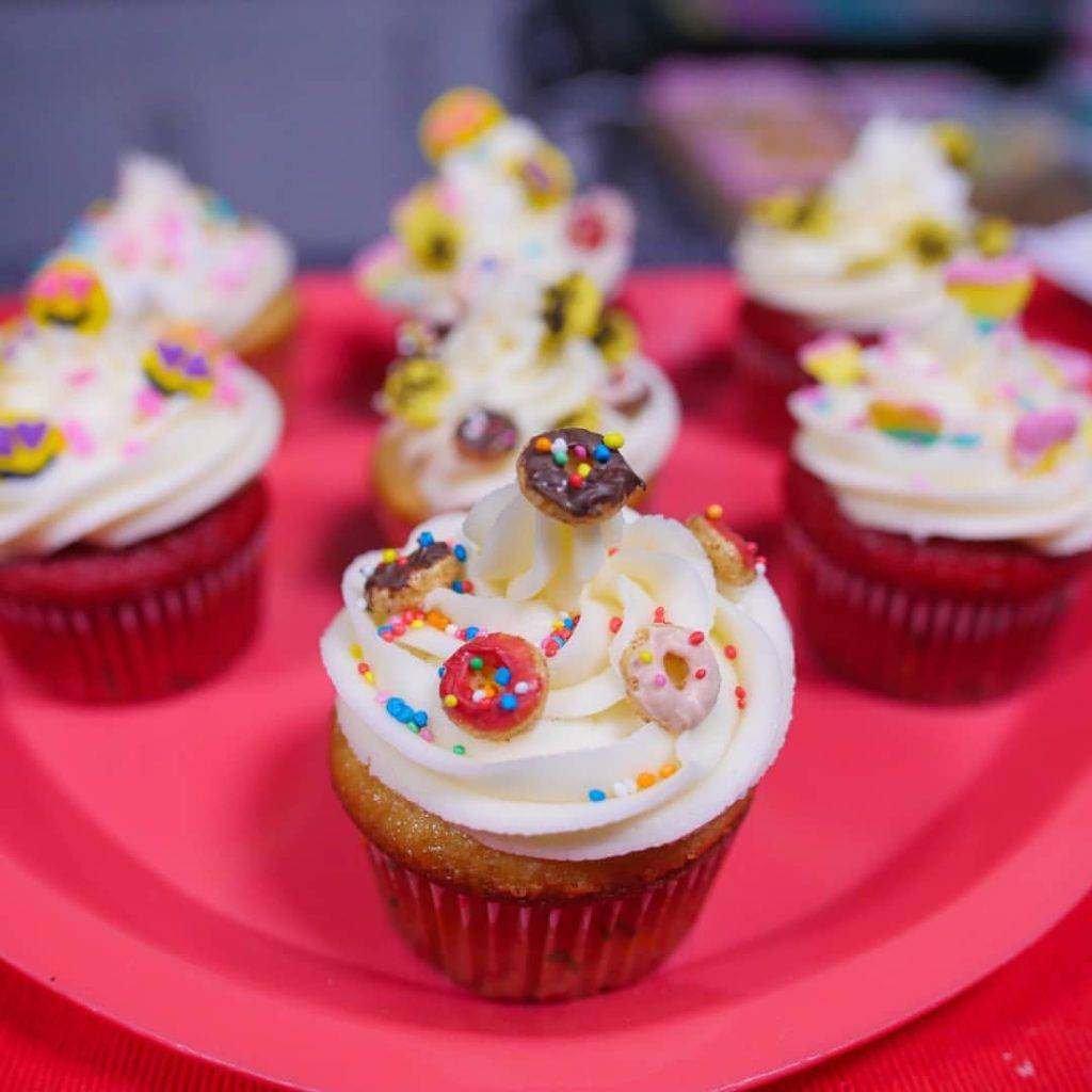 Cupcakes topped with homemade donut-shaped sprinkles 